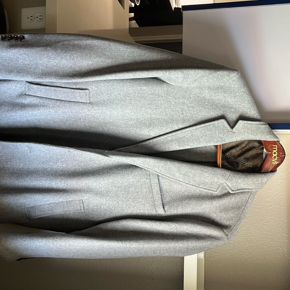 Beautiful long coat for men. Three front pockets and two inside pockets.